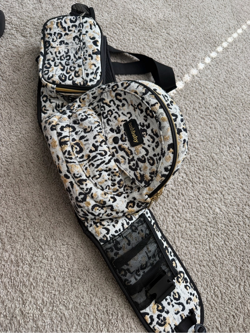 Tushbaby hip carrier in Snow Leopard